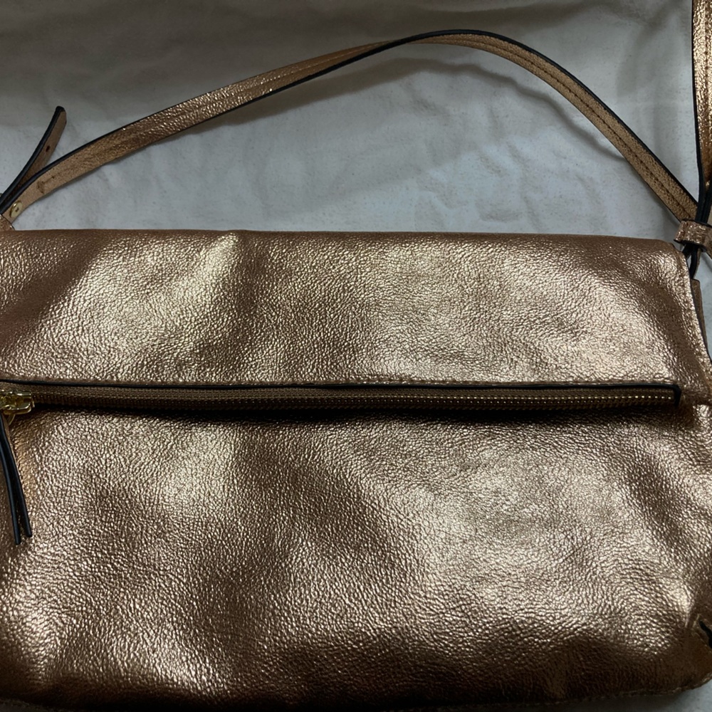 Like New Beautiful New Day Metallic  Rose Gold purse . Cross Body Strap